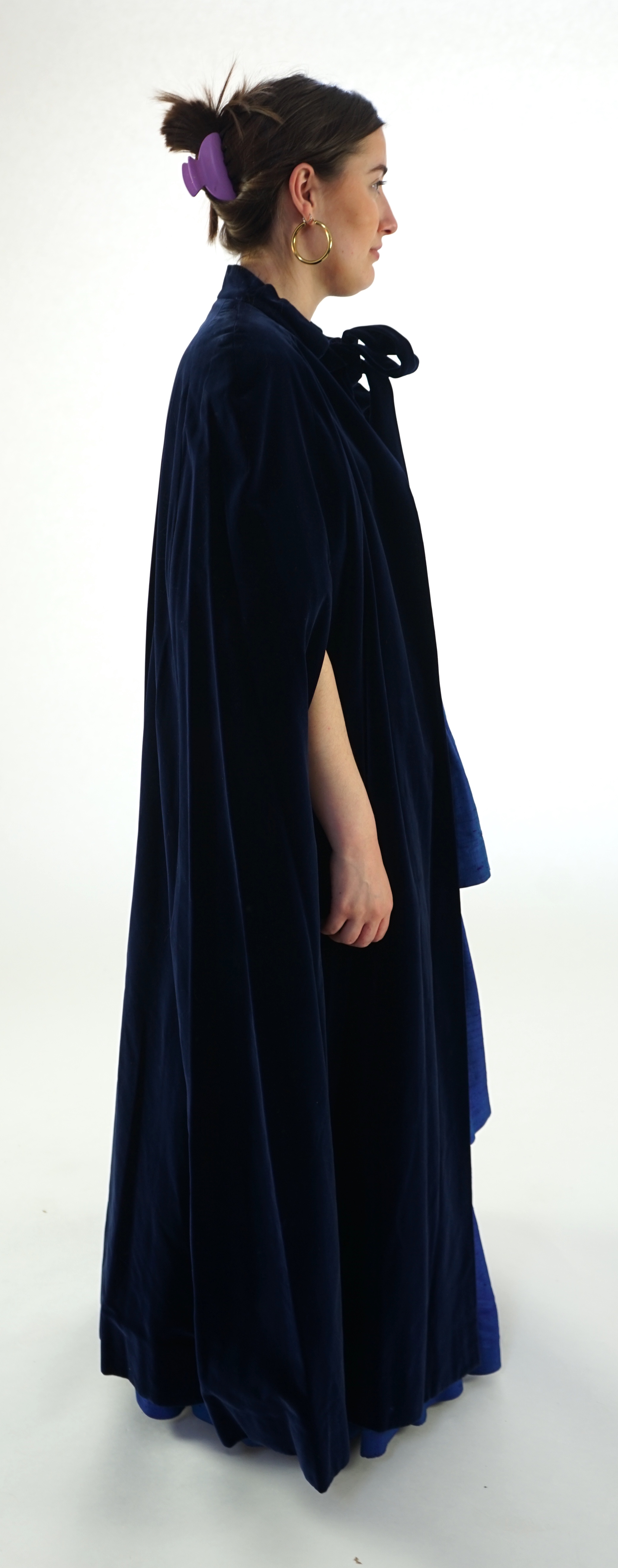 A lady's midnight blue long evening cape. Maindel label